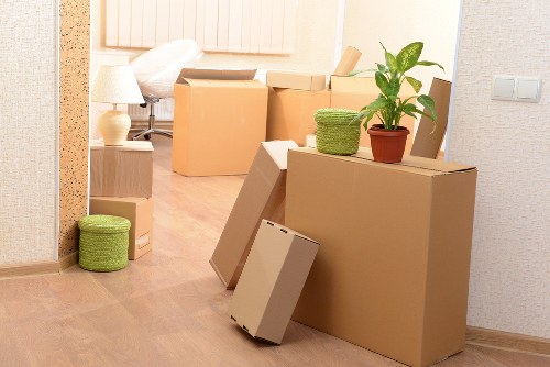 Organised storage unit in Mertonpark with boxes and furniture