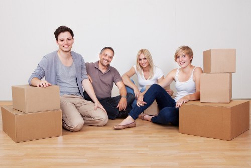 Professional movers handling compact furniture transport in Mertonpark